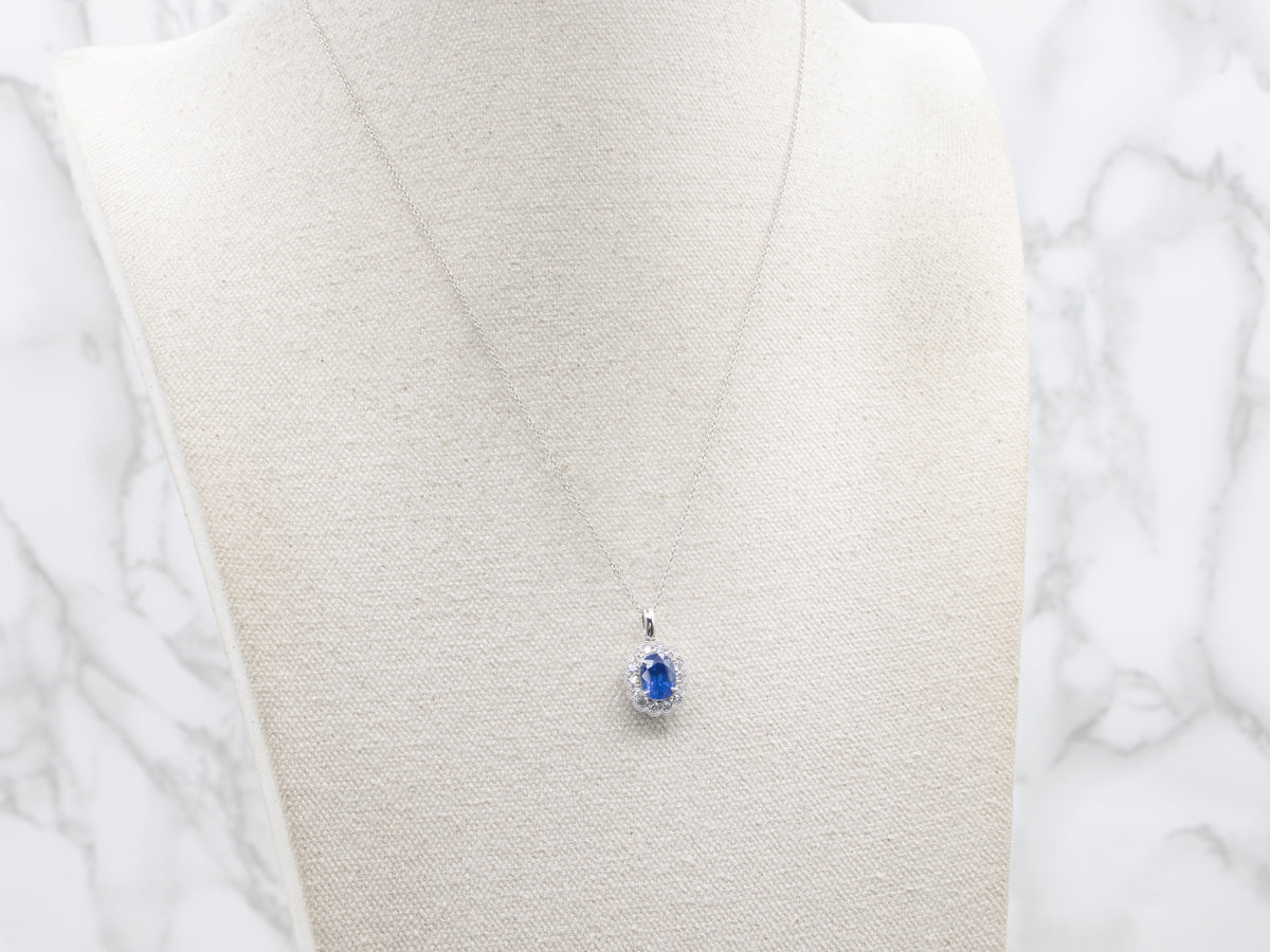 Modern Sapphire and Diamond Halo Pendant on Cable Chain