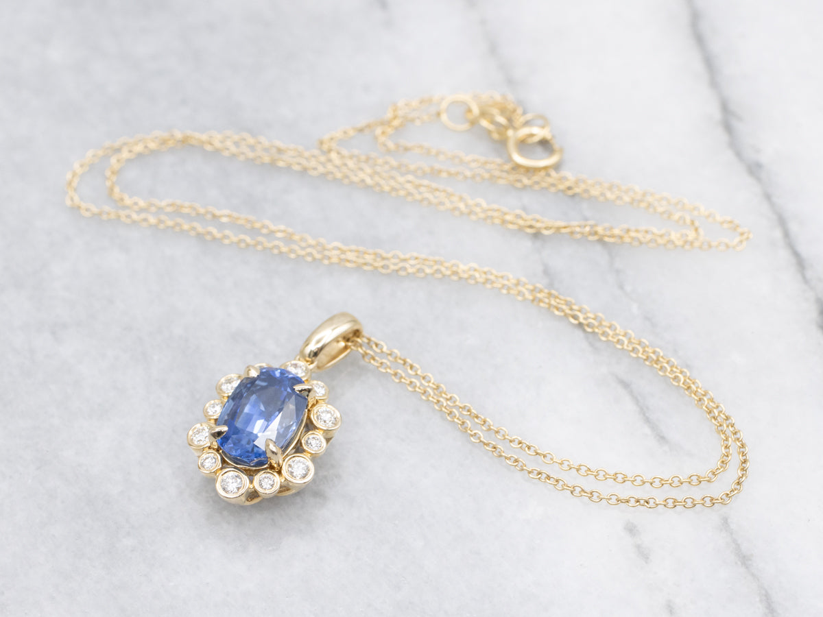 Modern Sapphire and Diamond Halo Pendant on Cable Chain