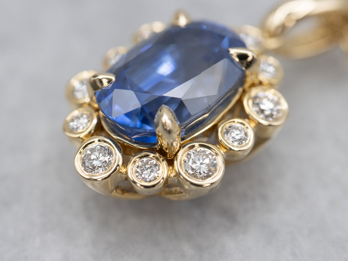 Modern Sapphire and Diamond Halo Pendant on Cable Chain