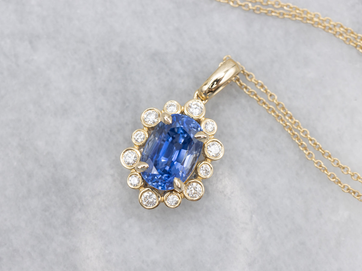 Modern Sapphire and Diamond Halo Pendant on Cable Chain