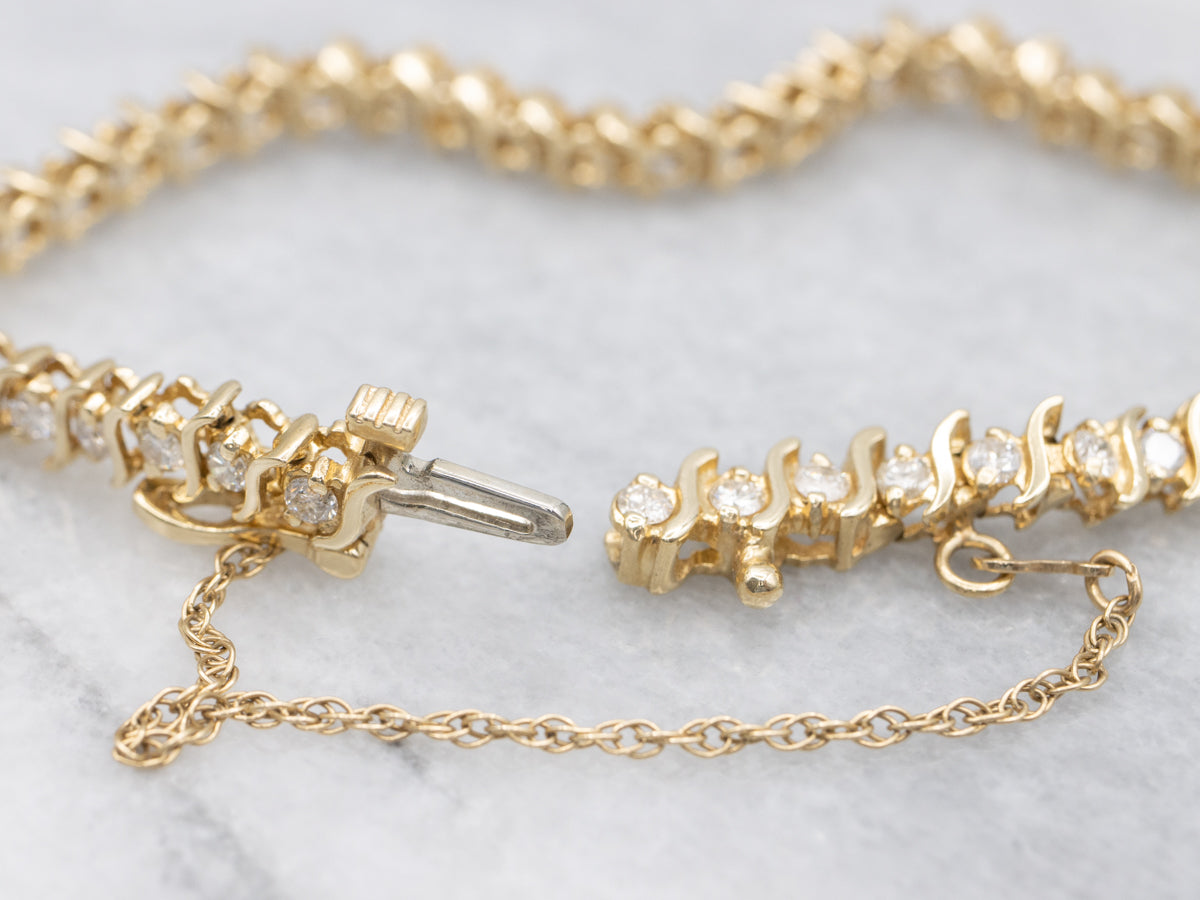 Diamond and Scrolling S-Link Tennis Bracelet
