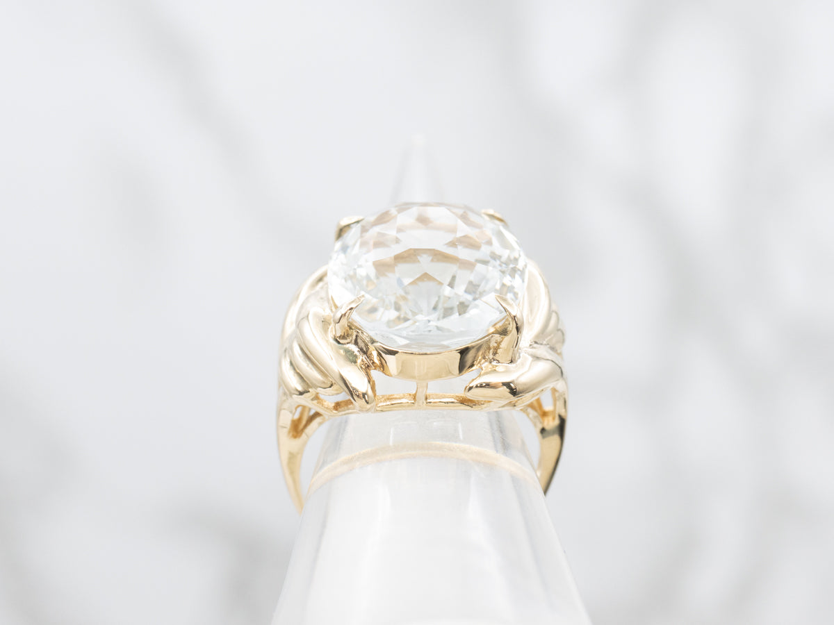 Anillo de cóctel con solitario ovalado de aguamarina grande de oro amarillo de 14 quilates