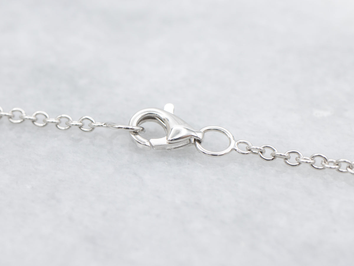 Modern Pink Tourmaline and Diamond Halo Pendant Necklace