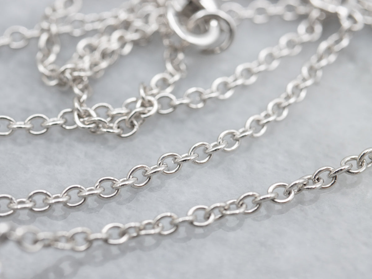 Modern Pink Tourmaline and Diamond Halo Pendant Necklace