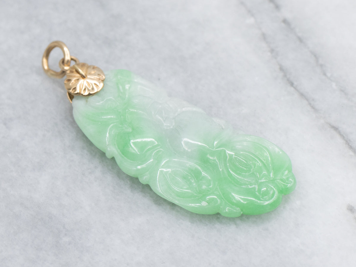 Carved Jadeite Pendant with Yellow Gold Flower Bail