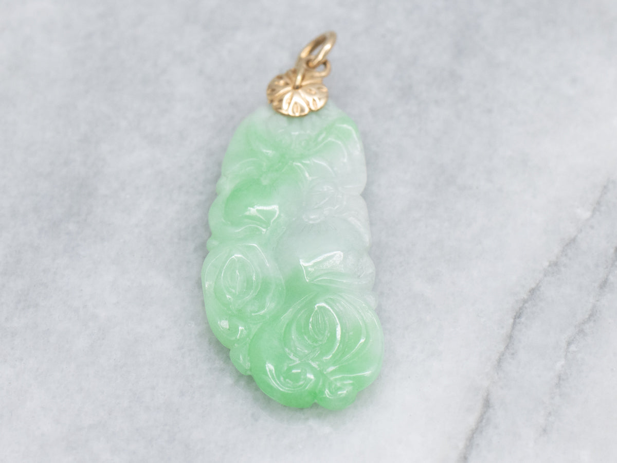 Carved Jadeite Pendant with Yellow Gold Flower Bail
