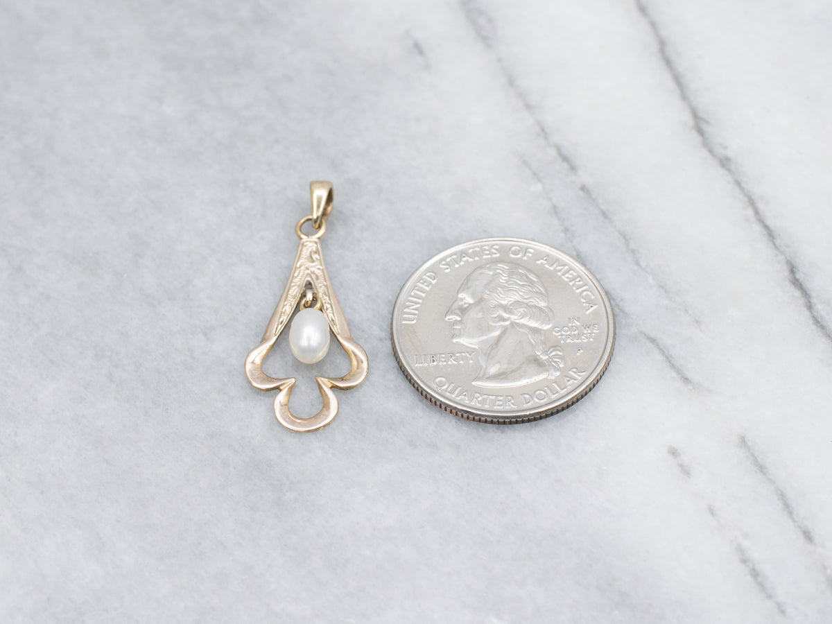 Engraved Gold Spade-Shaped Pendant with Swinging Freshwater Pearl Center