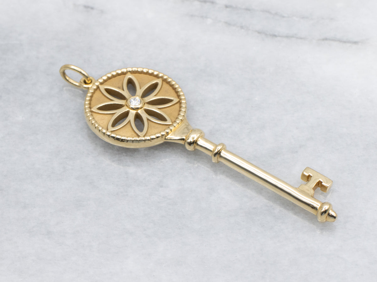 Tiffany & Co. 18K Yellow Gold Bezel Set Diamond  Daisy Key Pendant