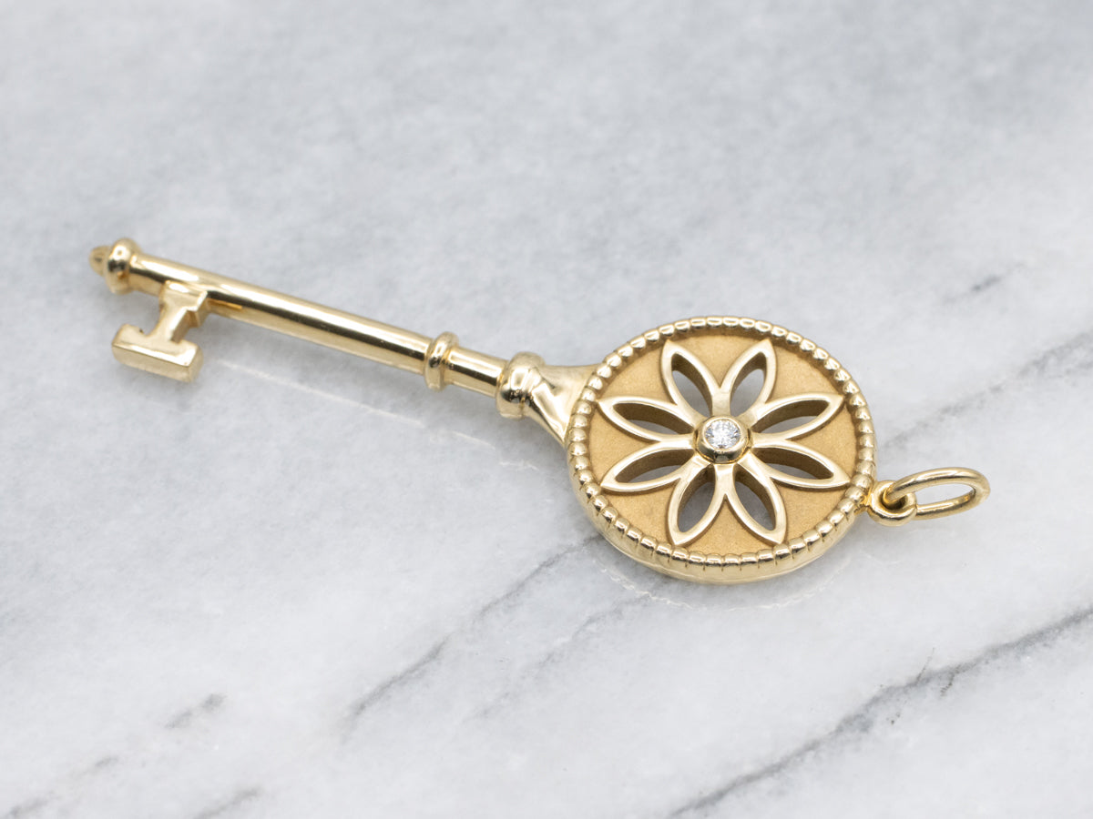 Tiffany & Co. 18K Yellow Gold Bezel Set Diamond  Daisy Key Pendant