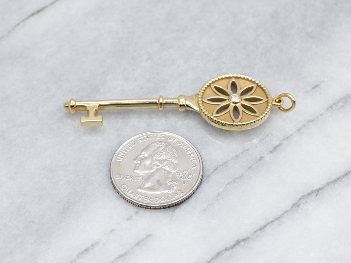 Tiffany & Co. 18K Yellow Gold Bezel Set Diamond  Daisy Key Pendant