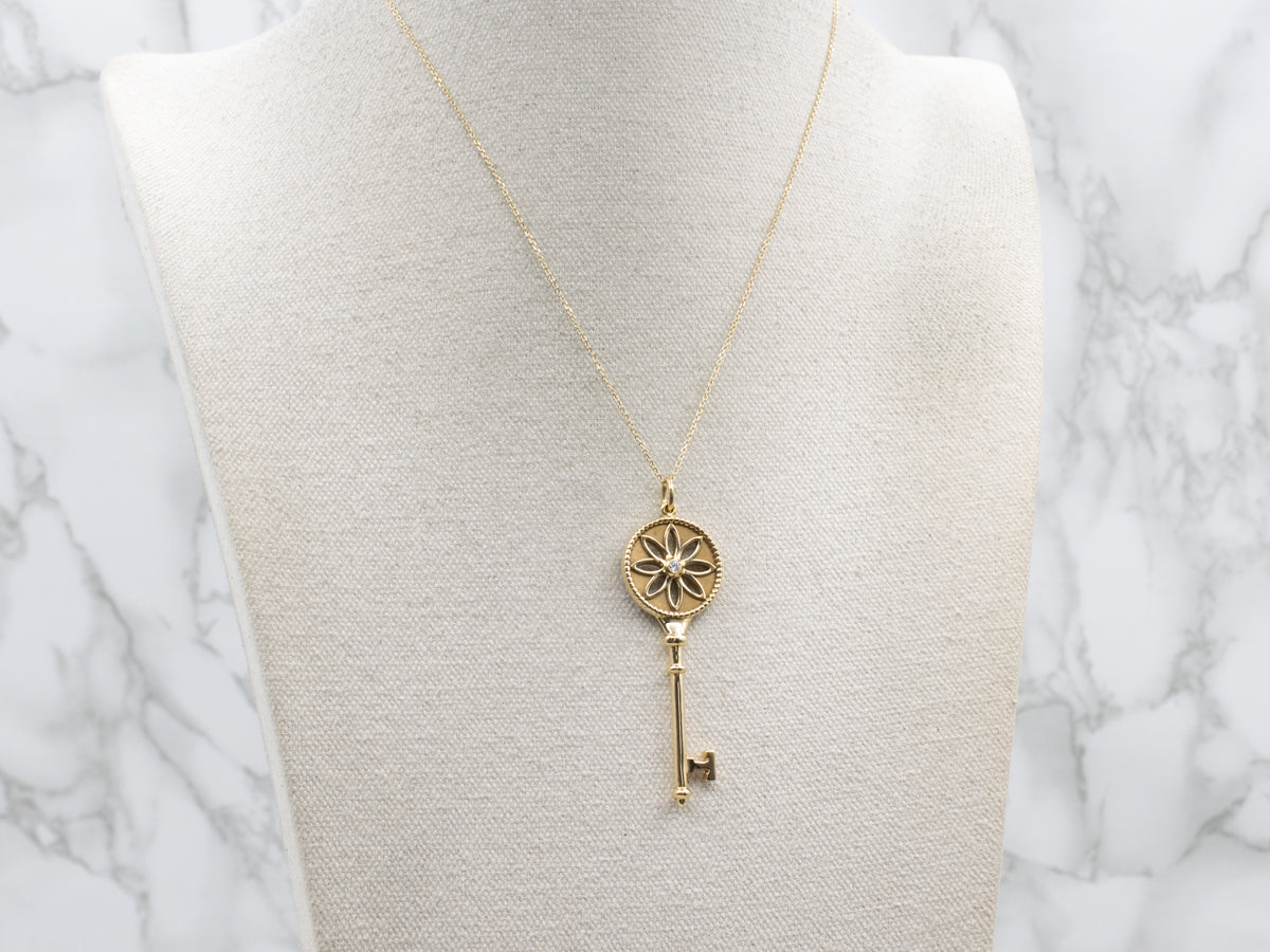 Tiffany & Co. 18K Yellow Gold Bezel Set Diamond  Daisy Key Pendant