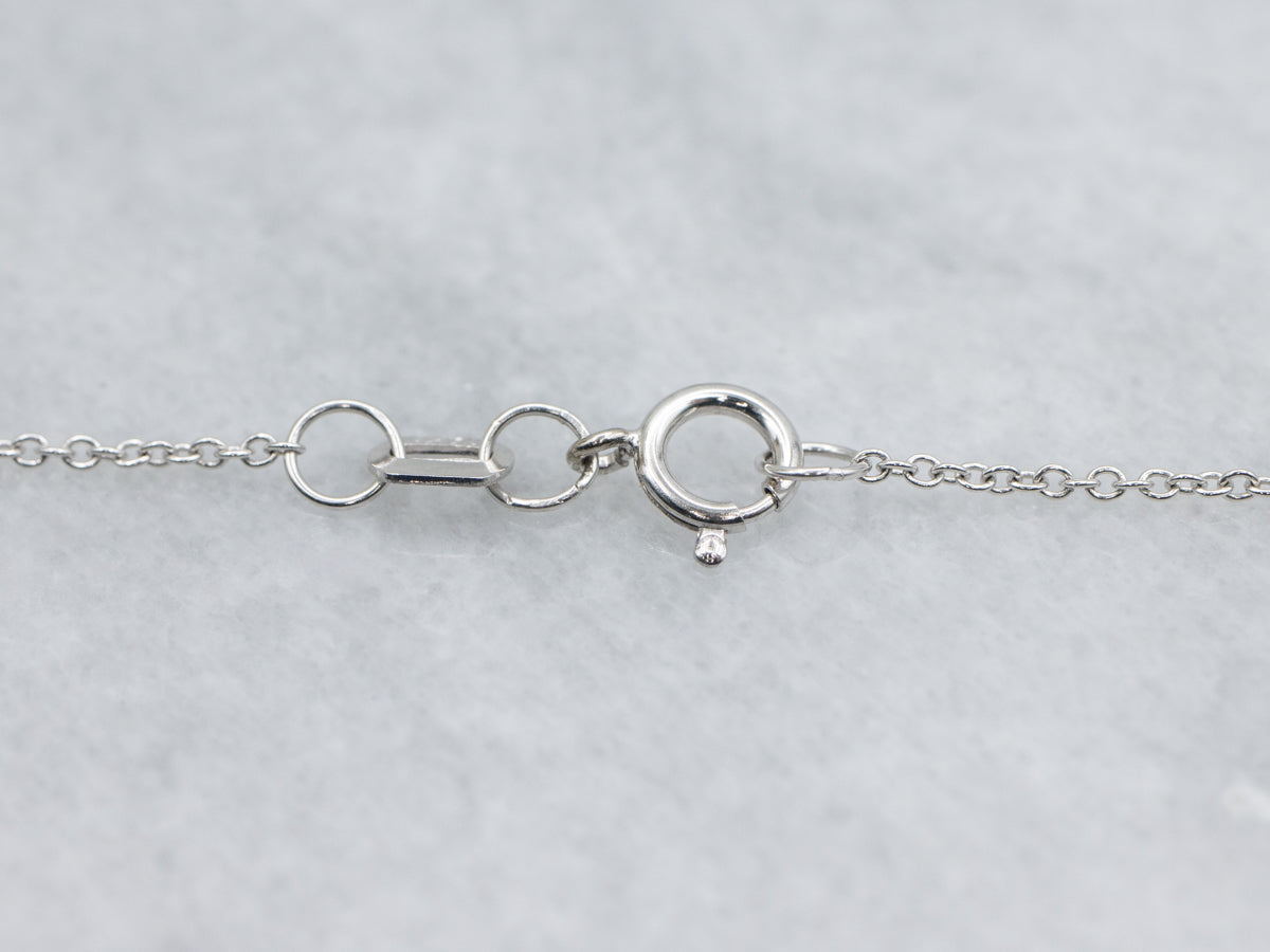 Modern Ruby and Teardrop Diamond Halo Pendant Necklace