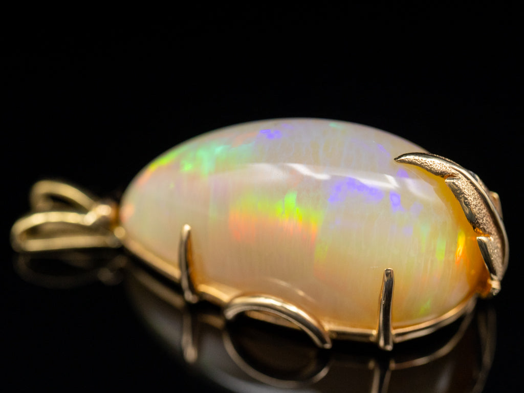 Fancy Cut Opal Gold Pendant