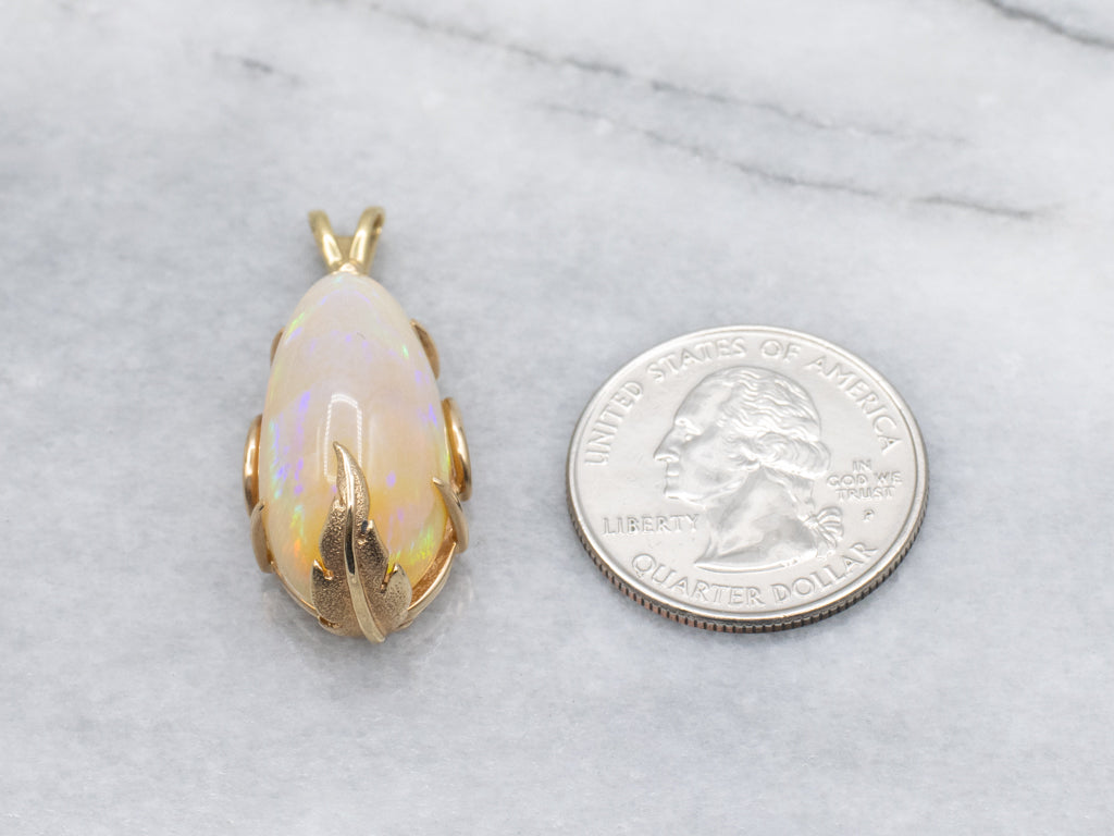 Fancy Cut Opal Gold Pendant
