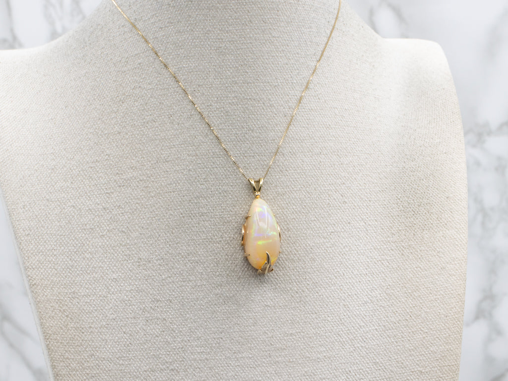 Fancy Cut Opal Gold Pendant