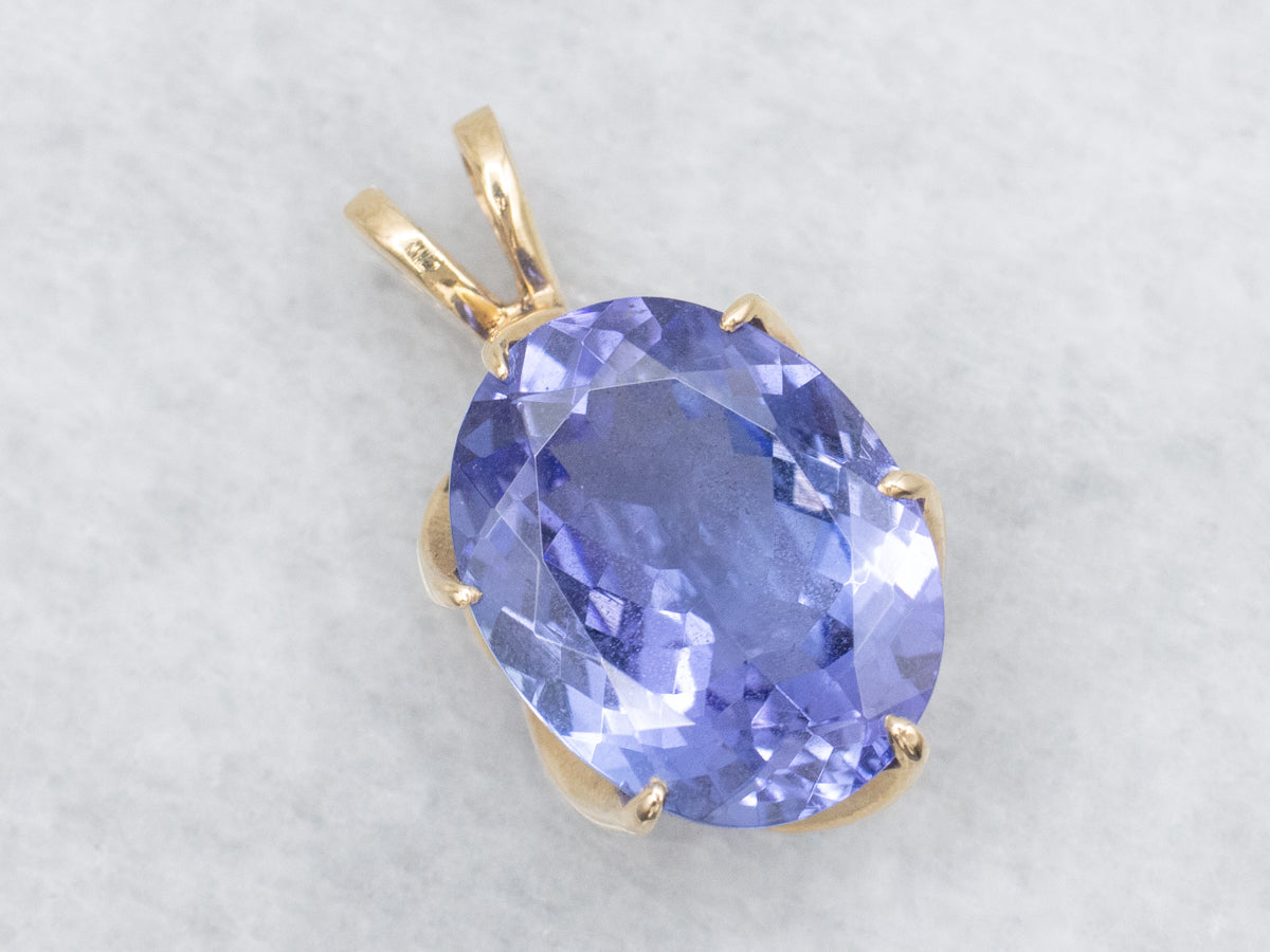Cool Blues, Pretty Tanzanite Pendant  in Yellow Gold