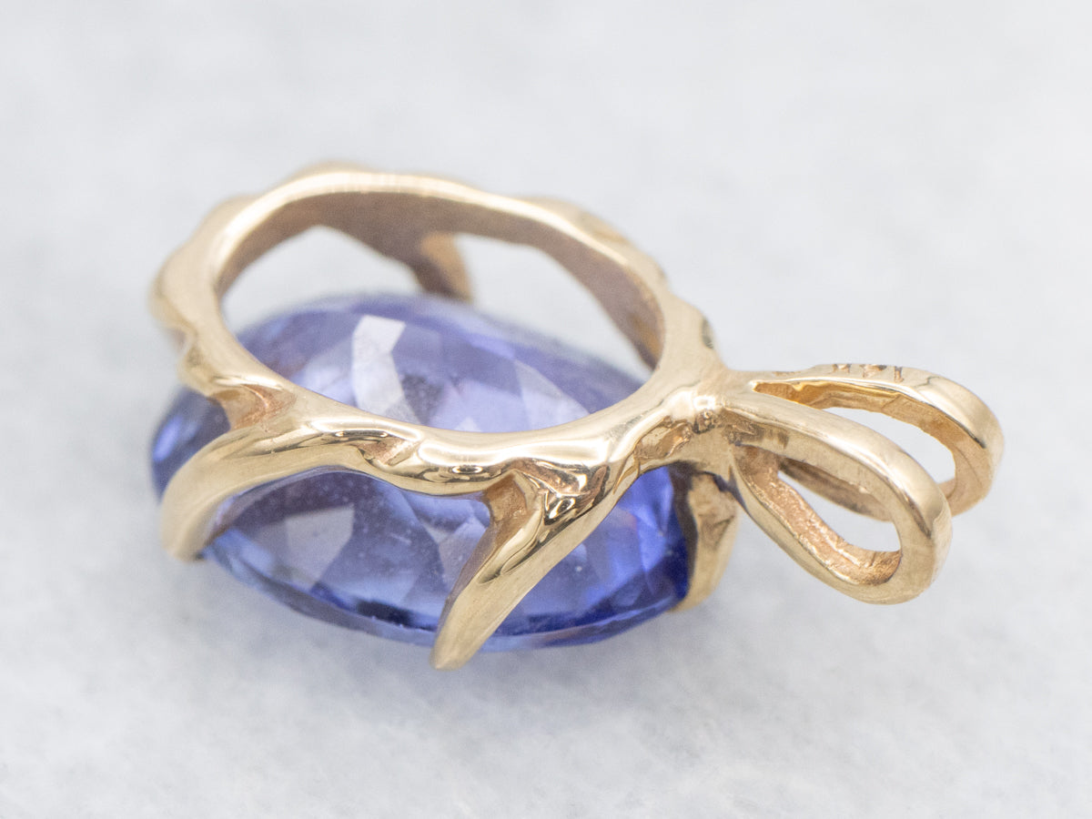 Cool Blues, Pretty Tanzanite Pendant  in Yellow Gold