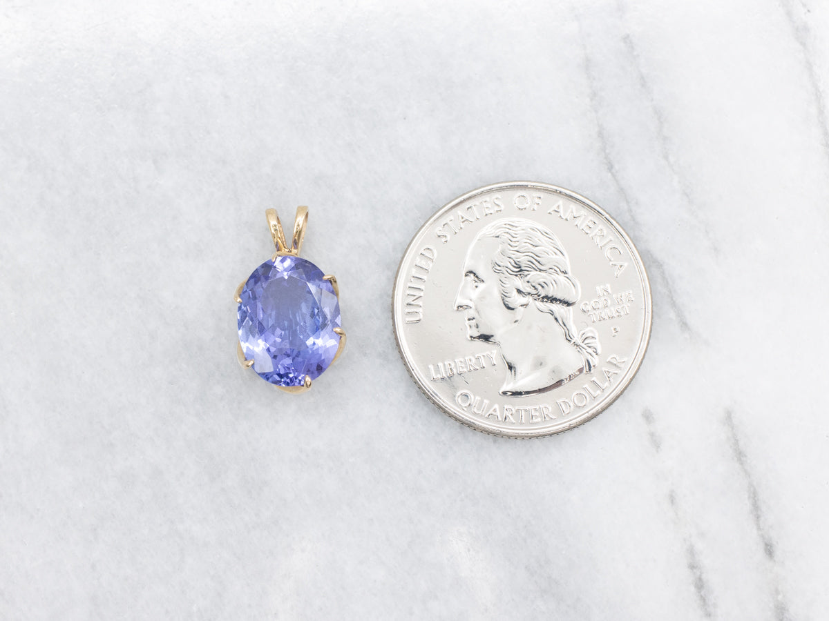 Cool Blues, Pretty Tanzanite Pendant  in Yellow Gold