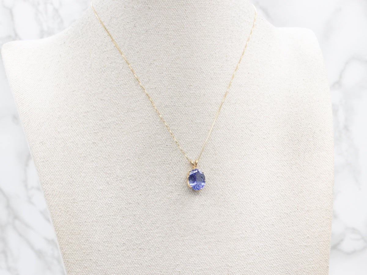 Cool Blues, Pretty Tanzanite Pendant  in Yellow Gold