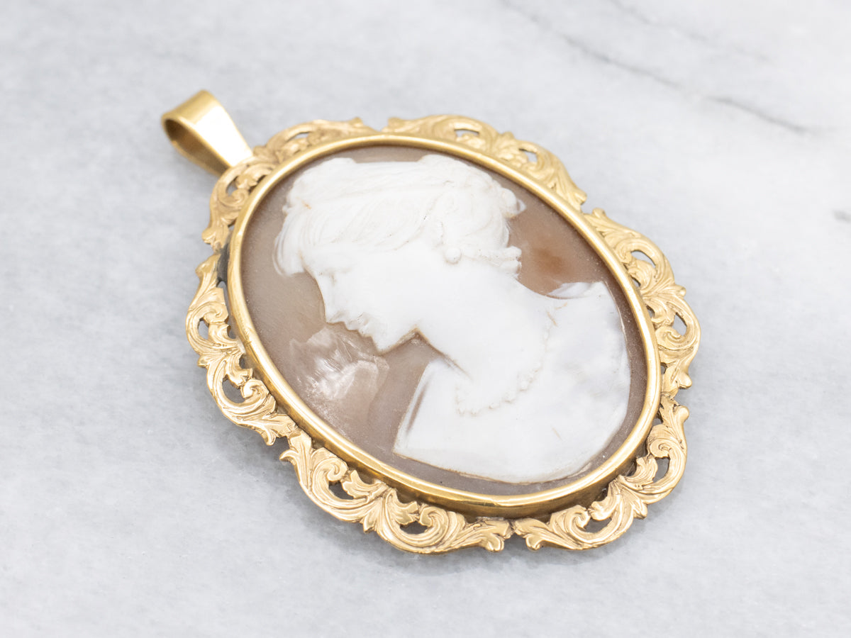 Fine Shell Cameo Pendant with Filigree Frame in Yellow Gold