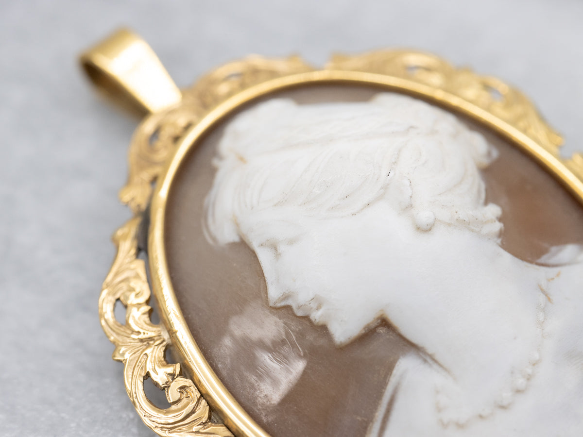 Fine Shell Cameo Pendant with Filigree Frame in Yellow Gold