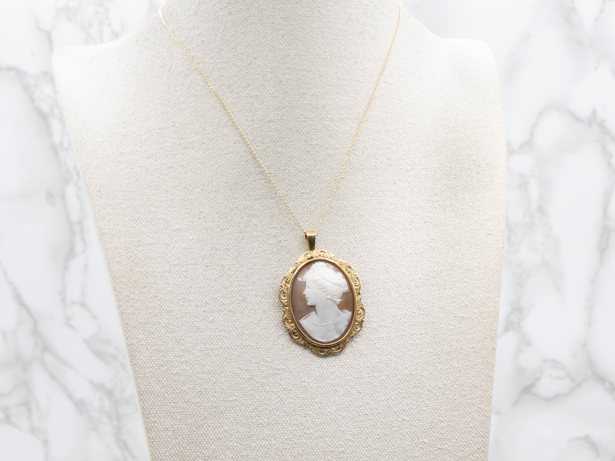 Fine Shell Cameo Pendant with Filigree Frame in Yellow Gold