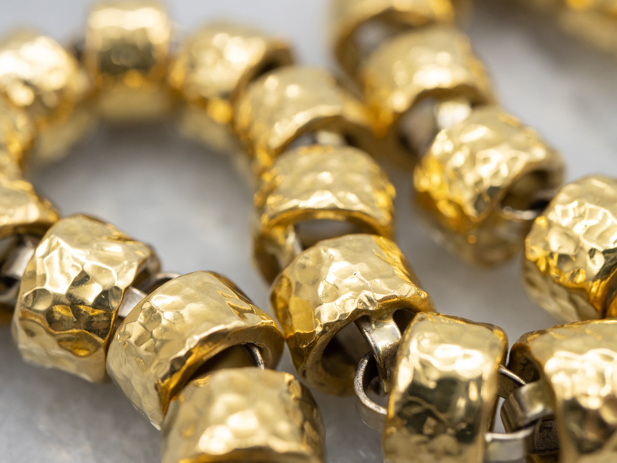 18-Karat Gold Bracelet with Faceted Links and Decorative Sapphire Cabochon Clasp