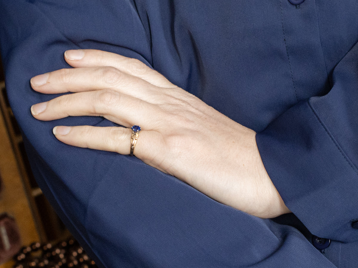 Blue Sapphire Christian Engagement Ring with Cross Motif