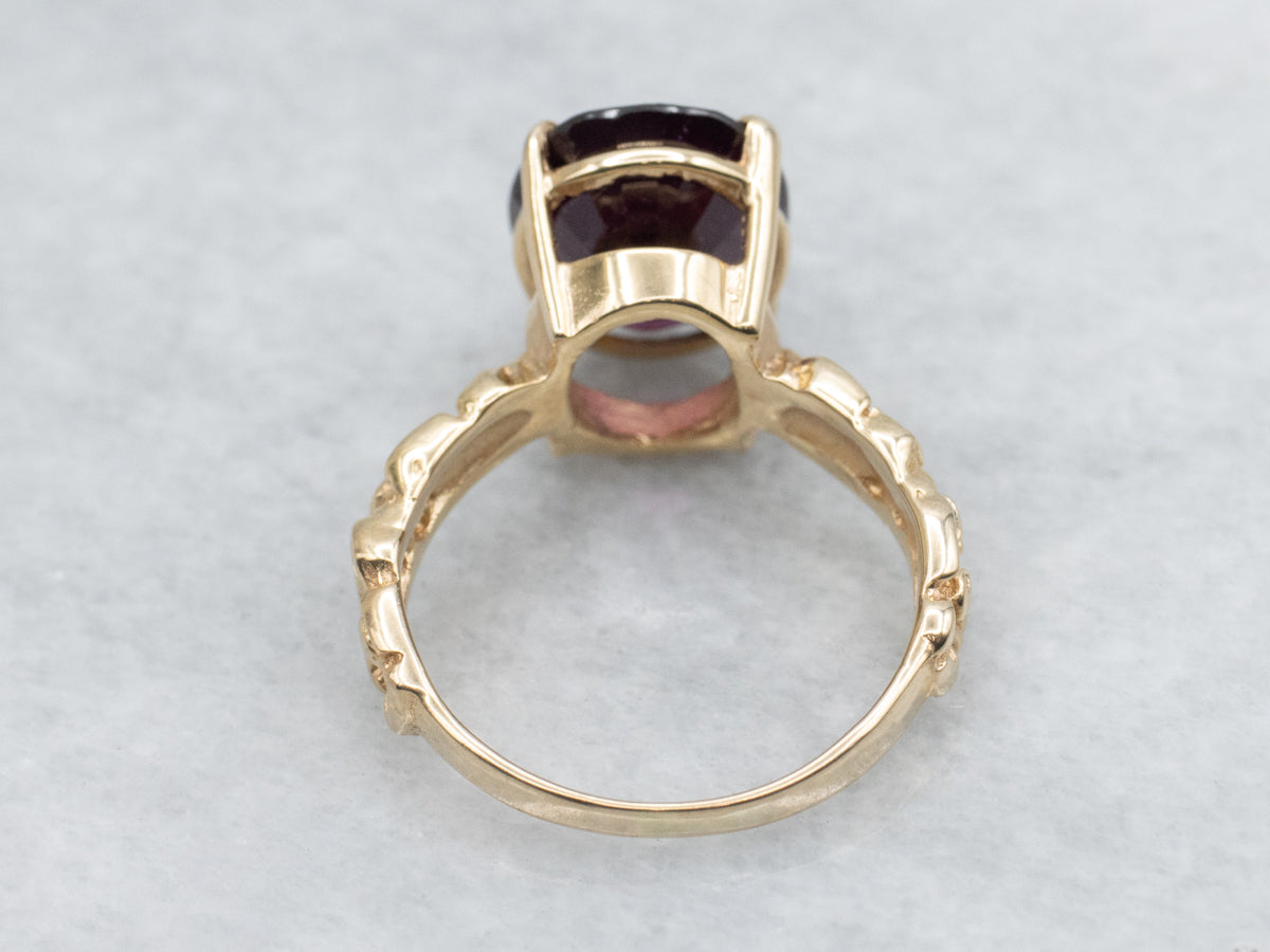 Oval Cut Grape Garnet in Vintage Gold Floral Solitaire Ring Setting