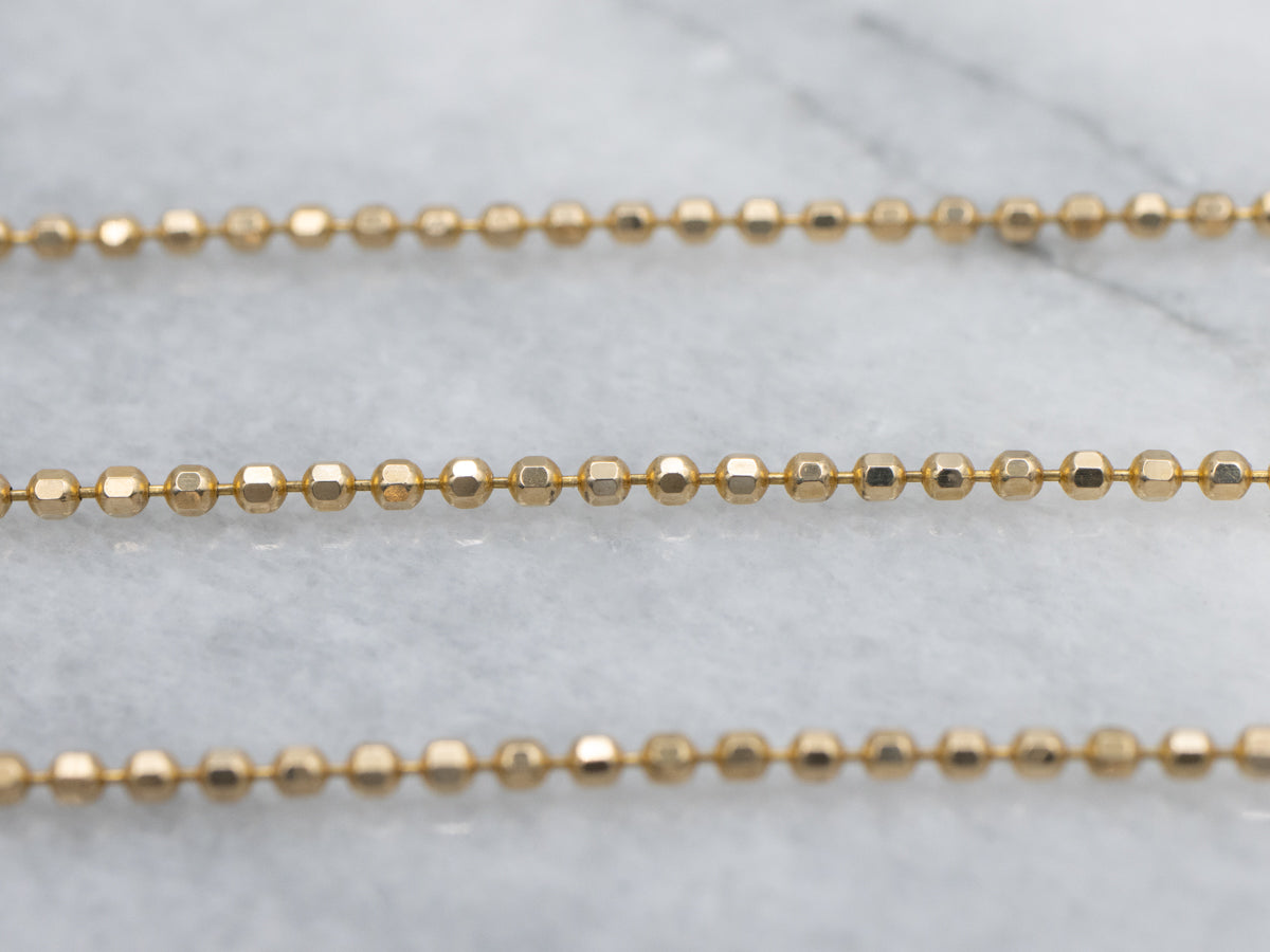 Long Gold Faceted Bead Chain