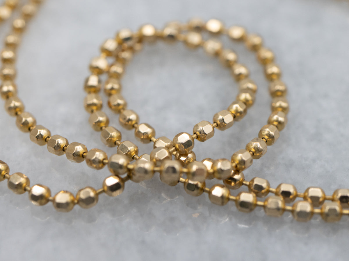 Long Gold Faceted Bead Chain