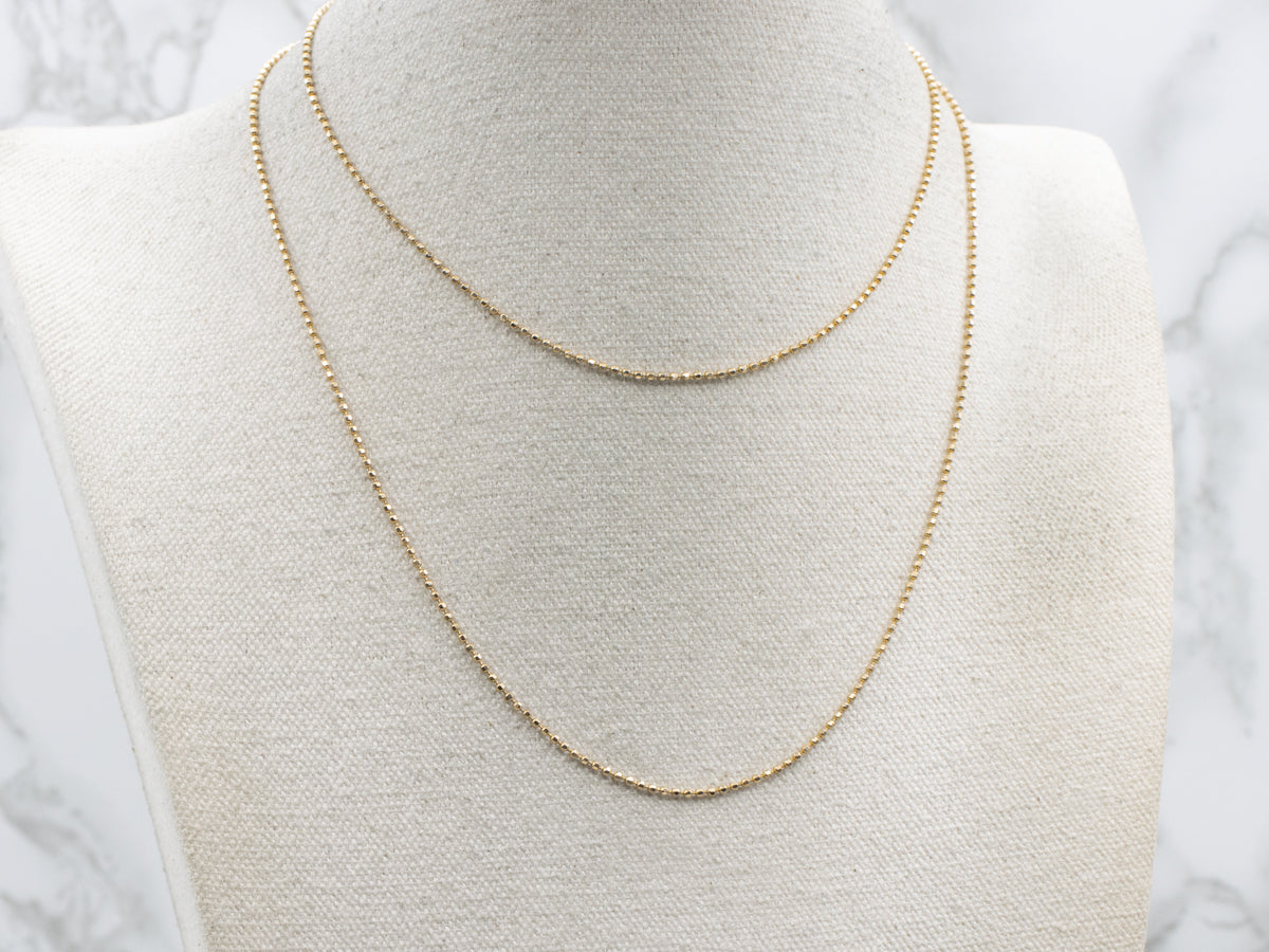 Long Gold Faceted Bead Chain