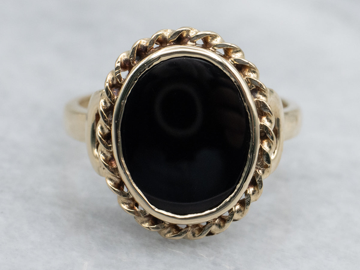 Mid-Century Black Onyx Ring with Twisted Frame