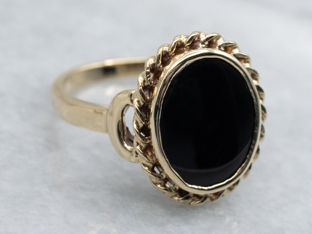 Mid-Century Black Onyx Ring with Twisted Frame