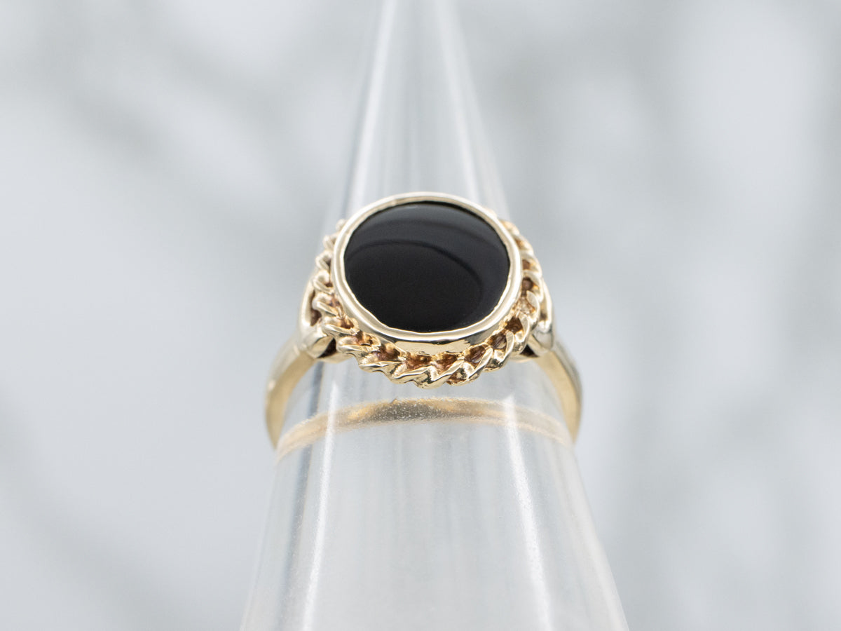Mid-Century Black Onyx Ring with Twisted Frame