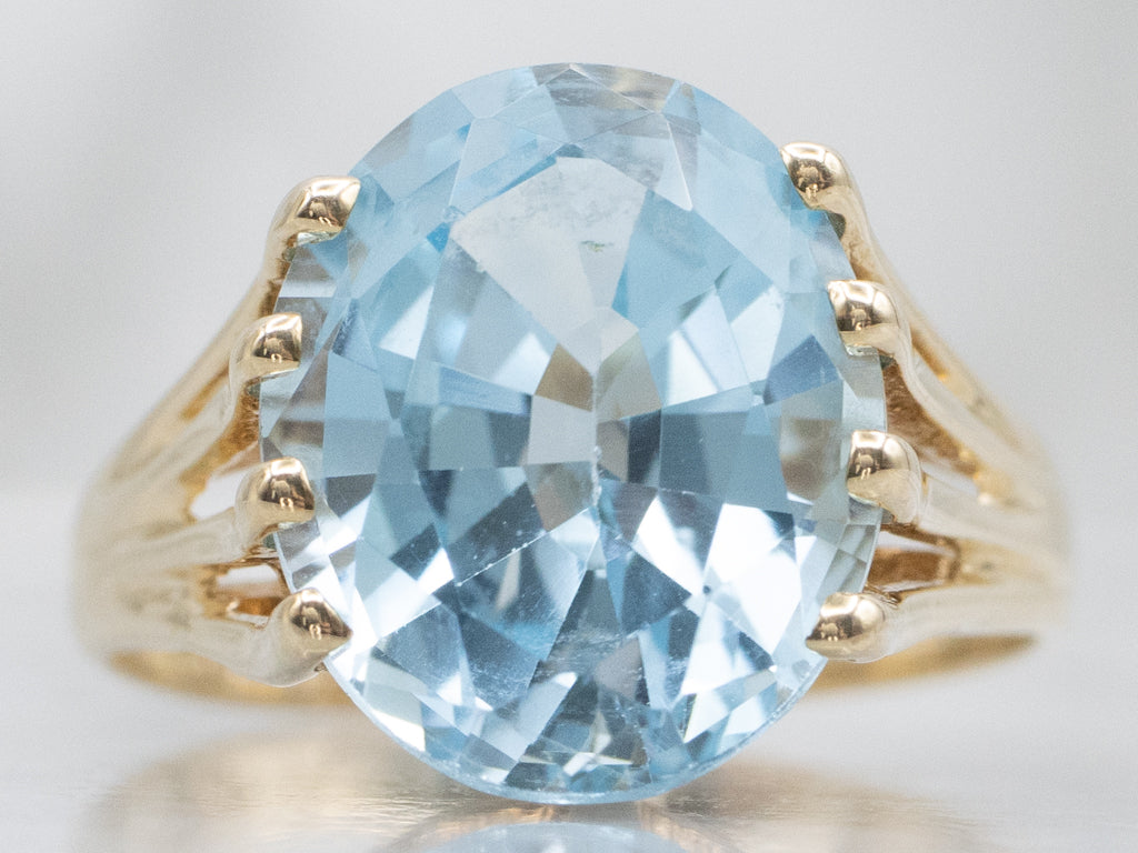 Yellow Gold Blue Topaz Solitaire Ring