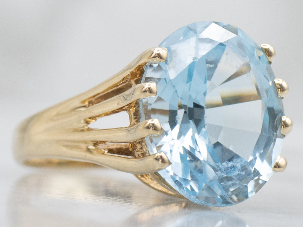 Yellow Gold Blue Topaz Solitaire Ring