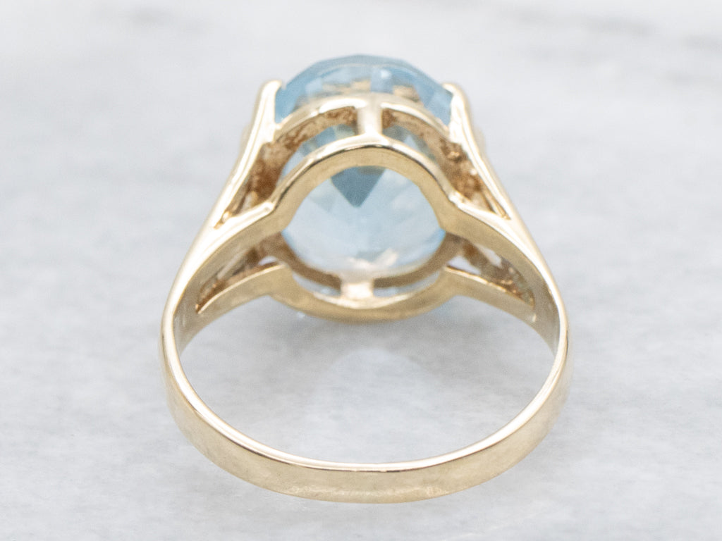 Yellow Gold Blue Topaz Solitaire Ring