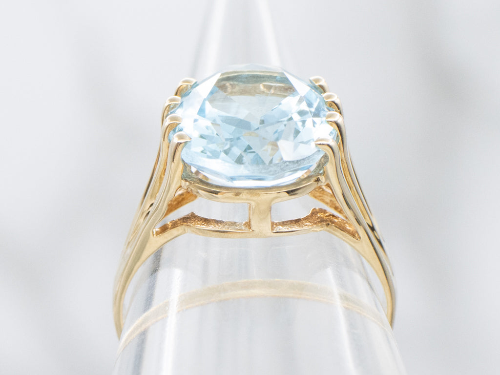 Yellow Gold Blue Topaz Solitaire Ring