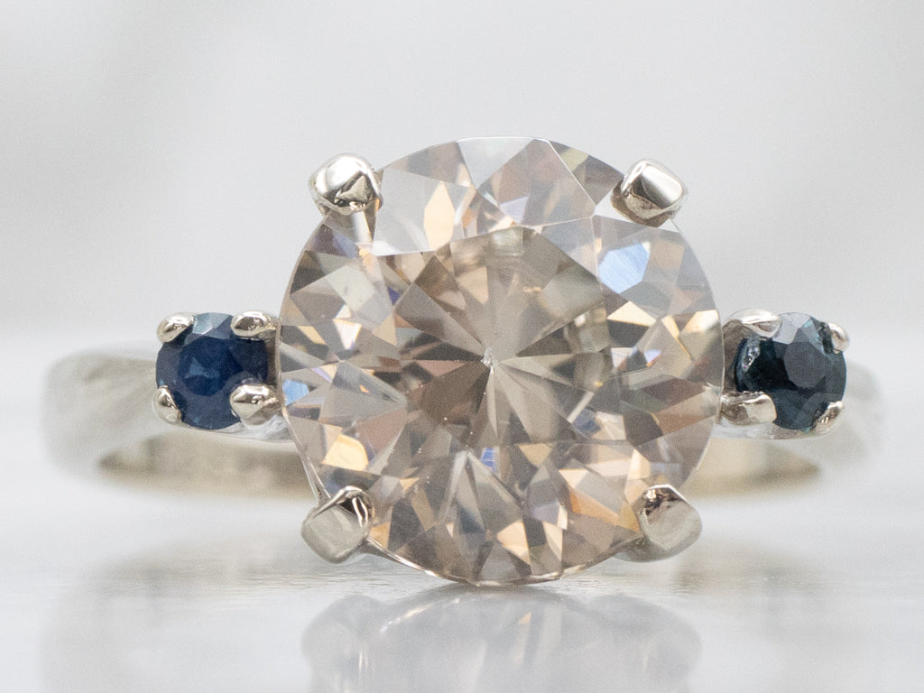 White Zircon and Sapphire Three Stone Ring