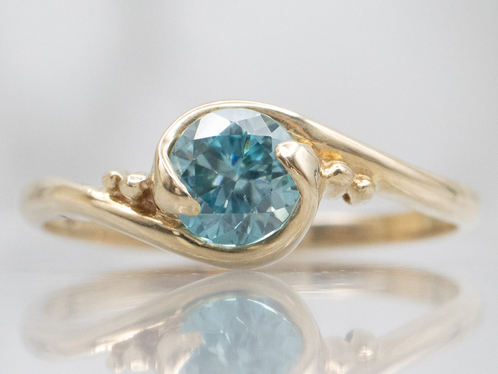 Yellow Gold Blue Zircon Bypass Ring
