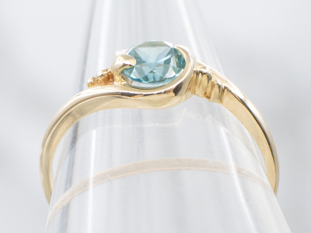 Yellow Gold Blue Zircon Bypass Ring