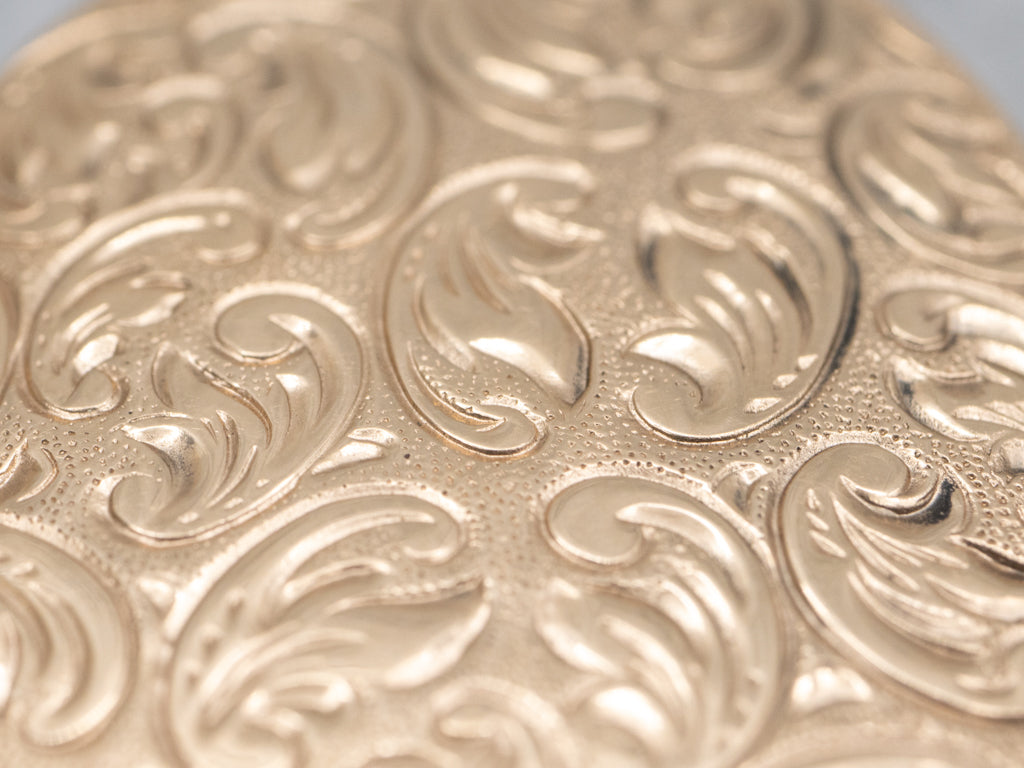 1940s Engraved English Gold Swirl Design Oval Locket