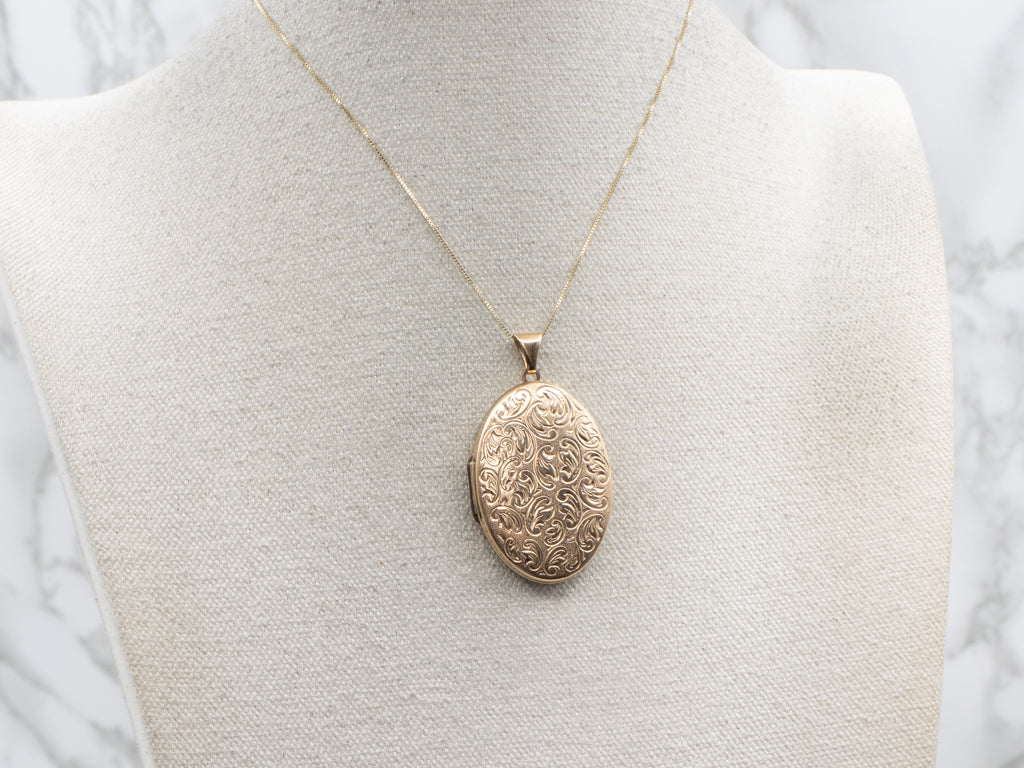 1940s Engraved English Gold Swirl Design Oval Locket