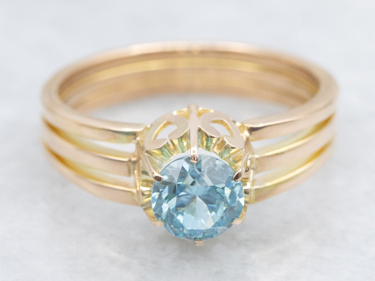 Bright Blue Zircon Rose Gold Solitaire Ring
