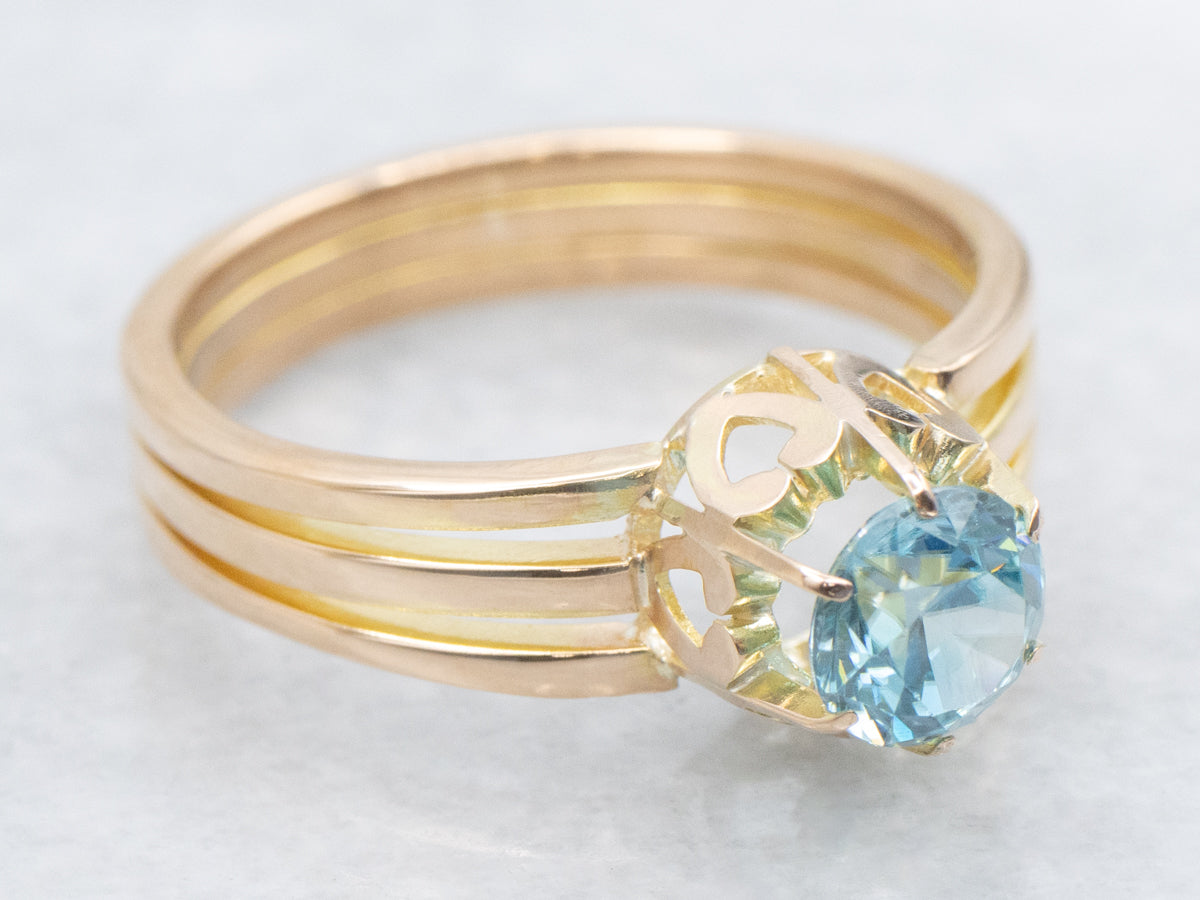 Bright Blue Zircon Rose Gold Solitaire Ring