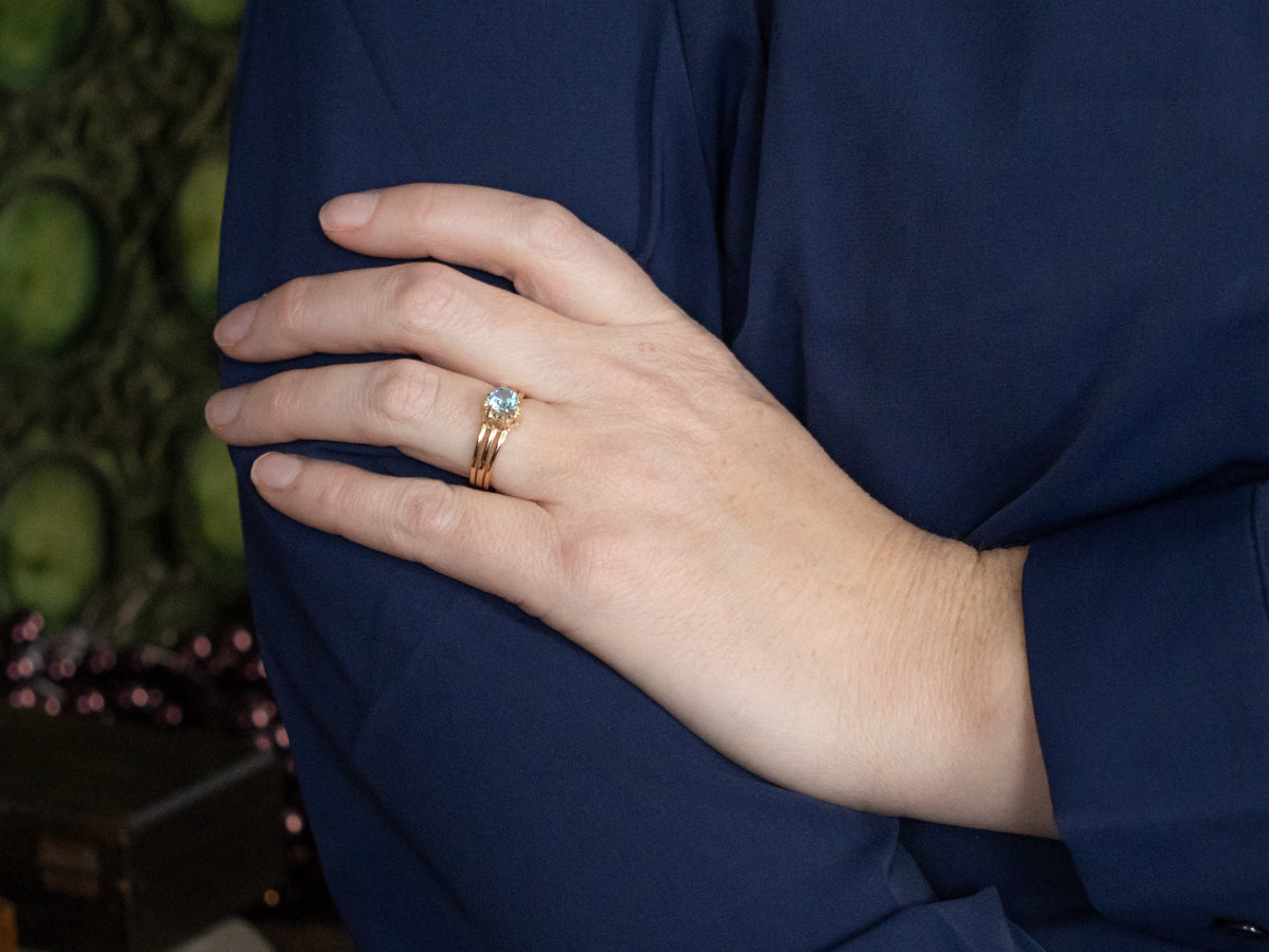 Bright Blue Zircon Rose Gold Solitaire Ring