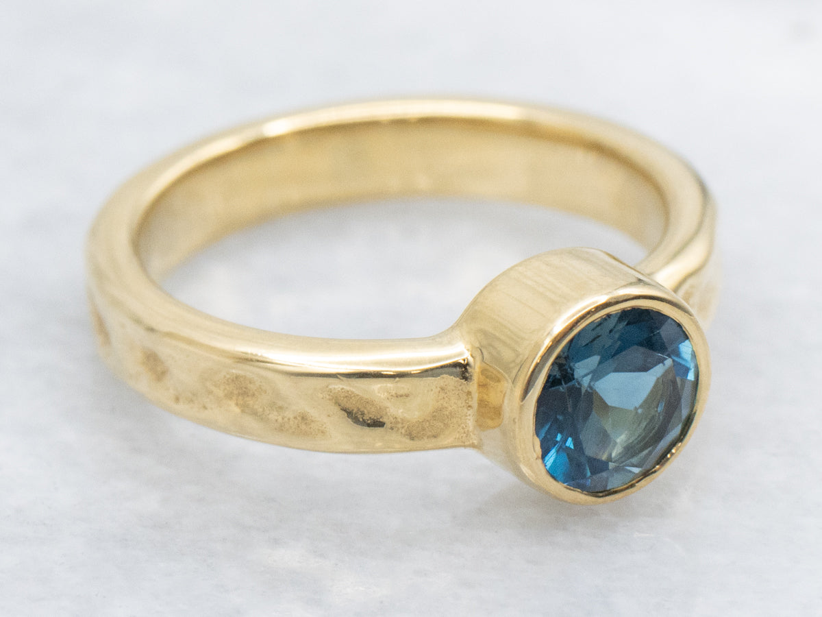 Bezel-Set Blue Topaz 18K Gold Solitaire Ring by Koplewitz Designer