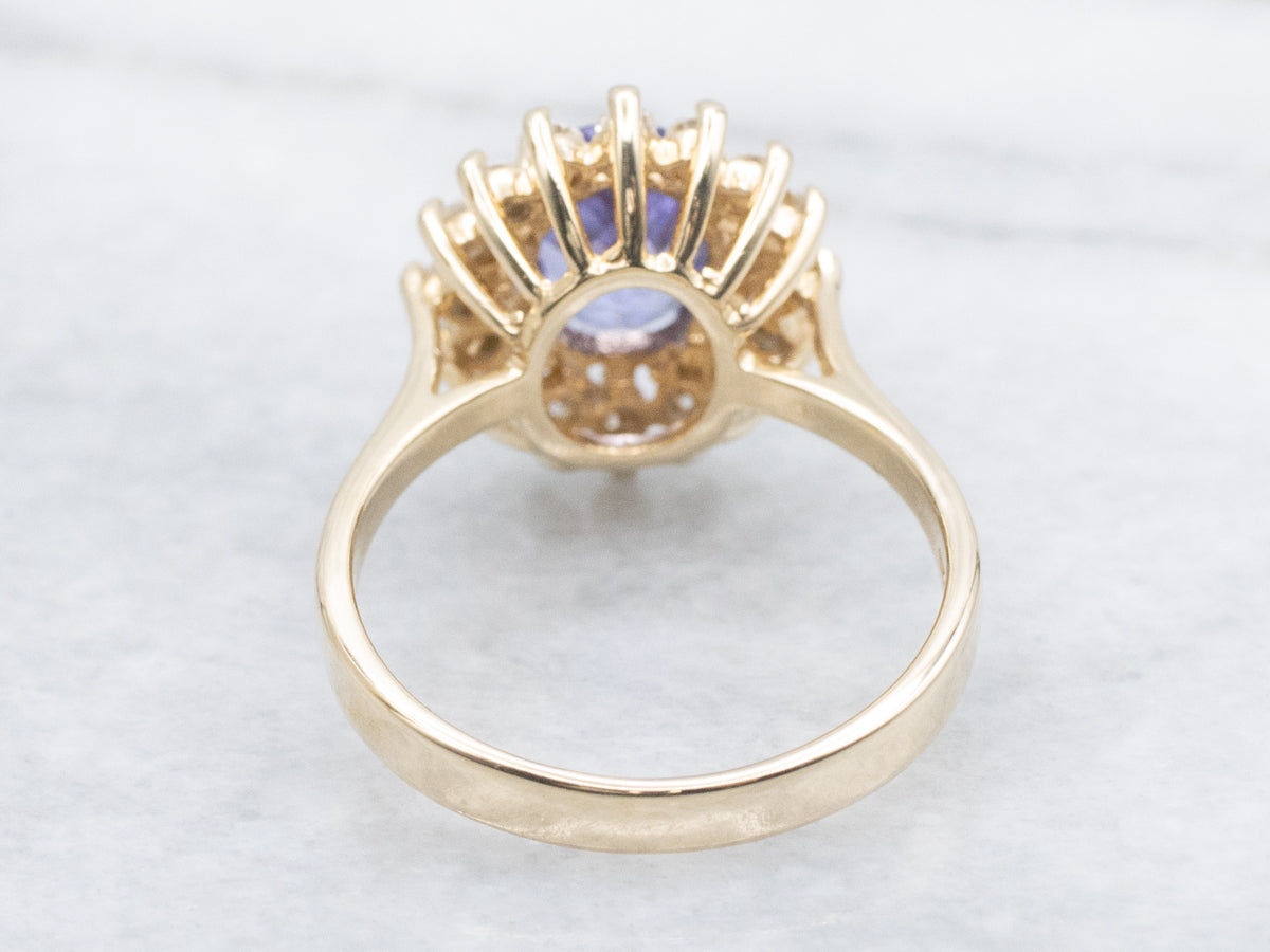 Tanzanite and Diamond Halo Yellow Gold Ring