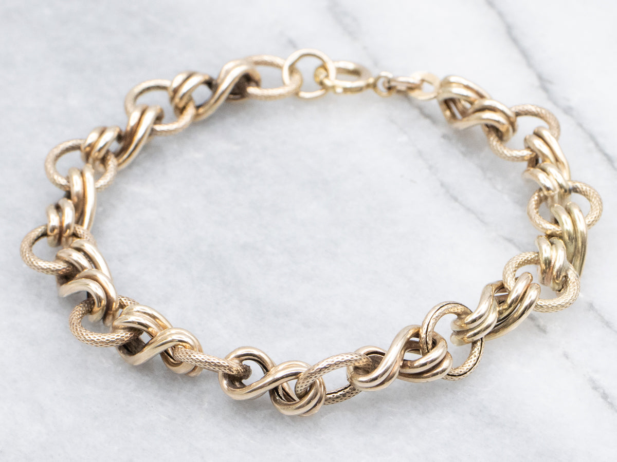 Antique Gold Textured and Twisting Link Bracelet